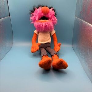 Plush Toy with Pink Fur and Orange Arms